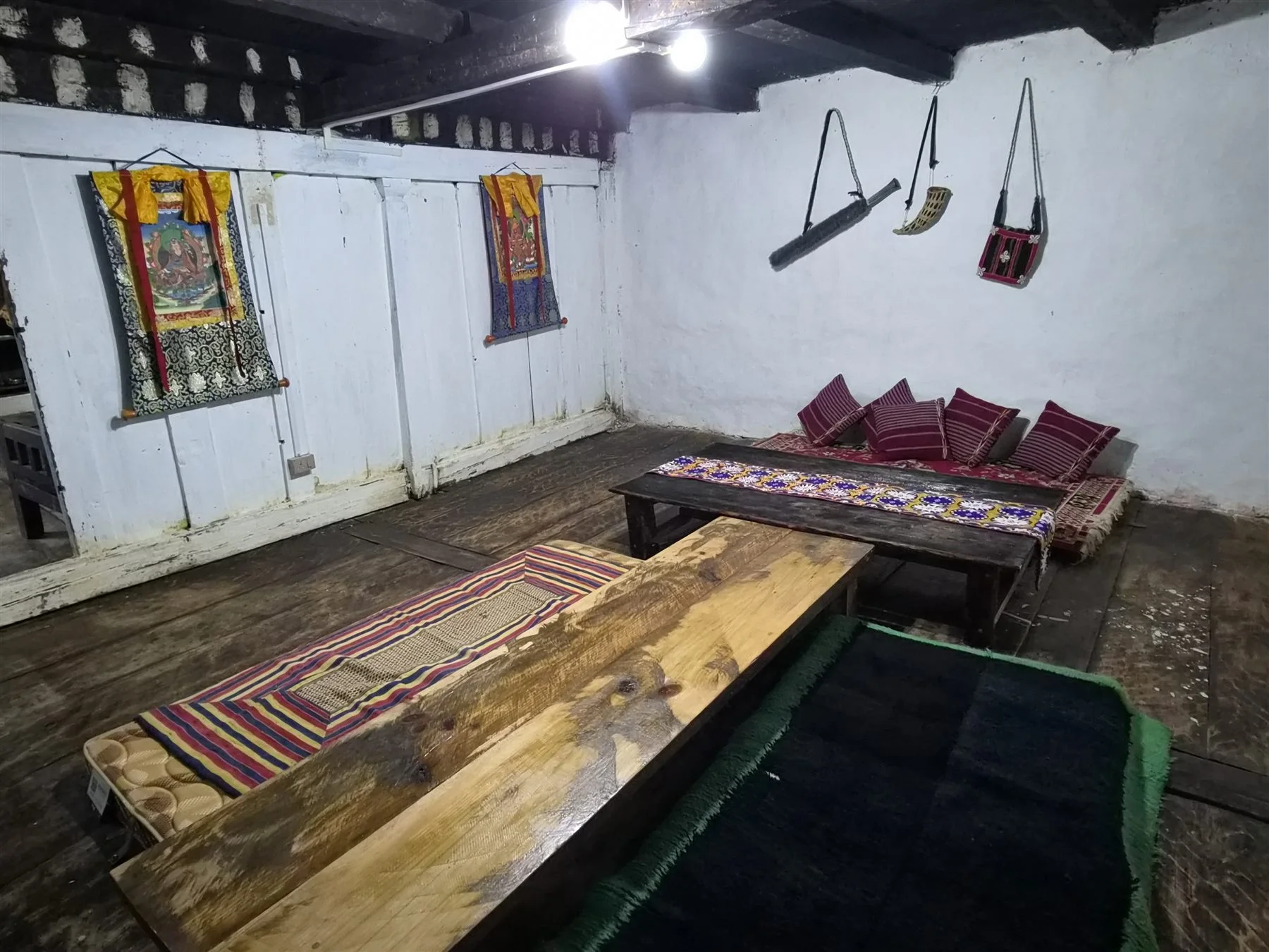 Traditional floor seating and low tables inside Dun Kitchen
